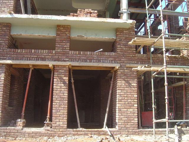 Construction of modified openings and new north wall