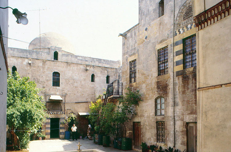 <p>Courtyard: view facing north, showing facade of reception hall (qa'a)</p>