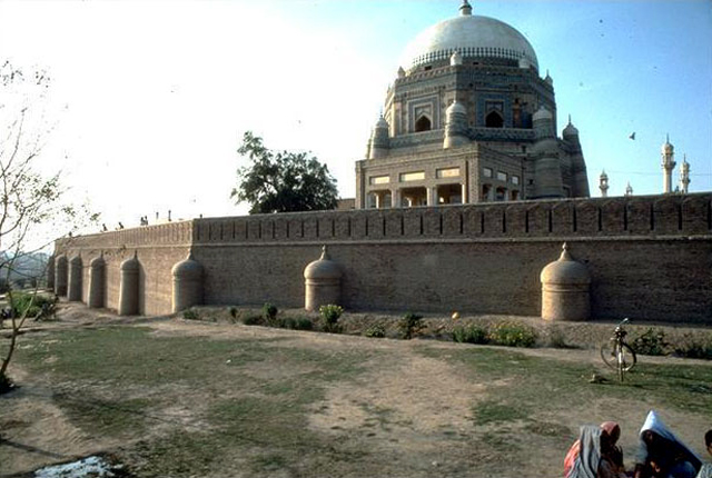 Exterior view from southeast showing the precinct wall and the domed mausoleum