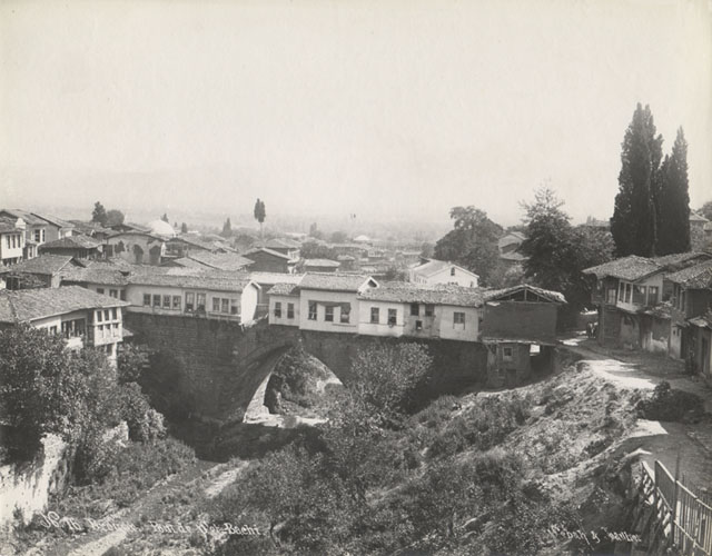 View from south, showing bridge lined with wooden houses prior to destruction during the Turco-Greek War