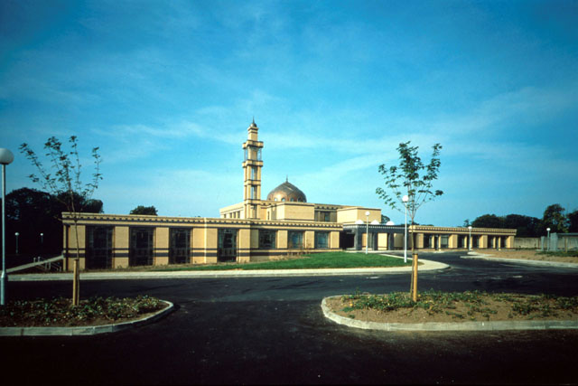 Exterior view showing façade, dome and minaret
