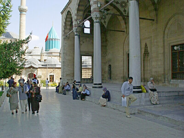 Exterior view, showing portico of mosque with Mevlana Museum seen in the background