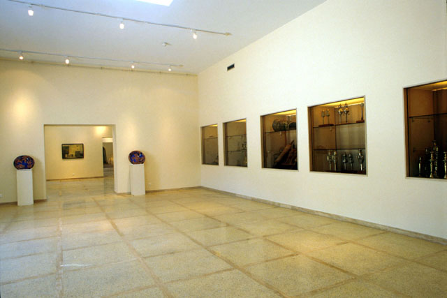 Musée du Judaïsme Marocain - Interior view of gallery executed with clean lines and inset display cabinets