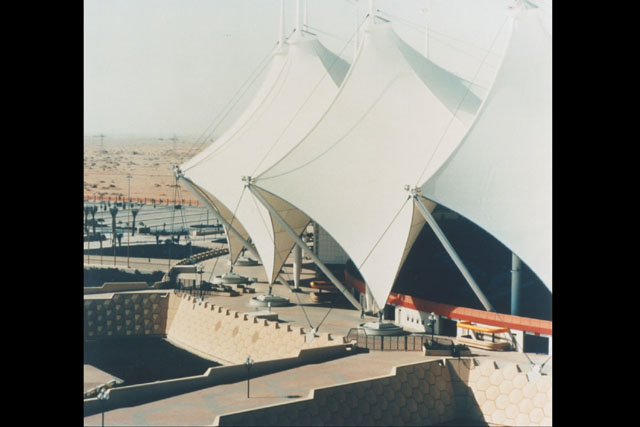Exterior detail showing scale design façade and sail inspired roof