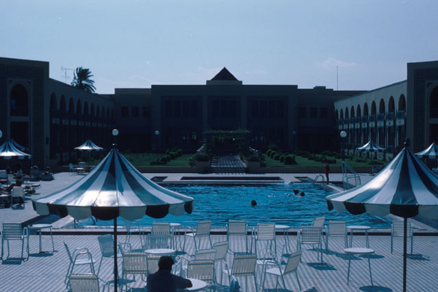 Exterior view across pool to grand entrance