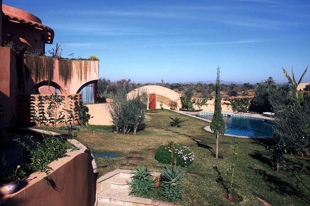 Amelkis Residence - View of garden with swimming pool