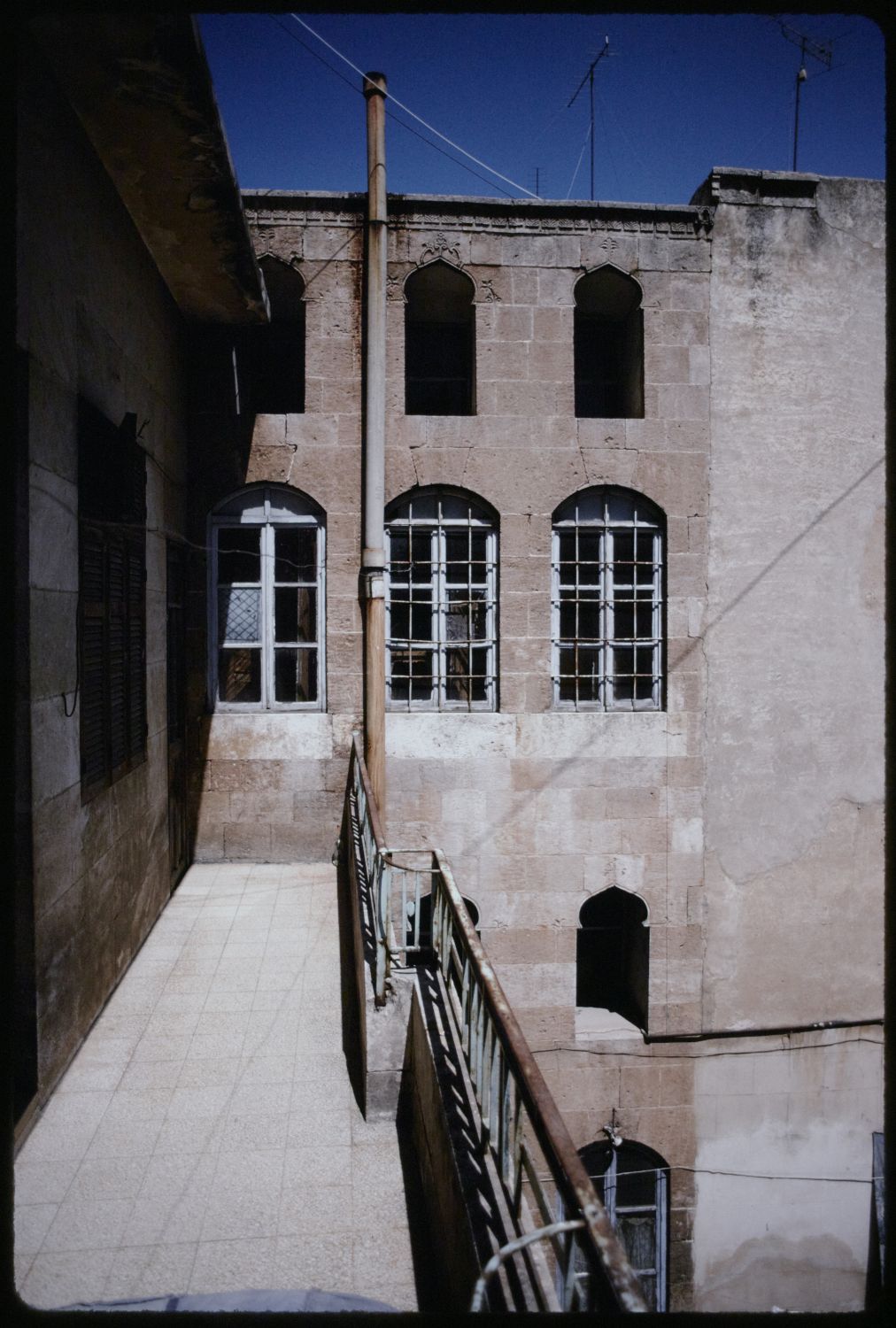 Second floor walkway along courtyard wall