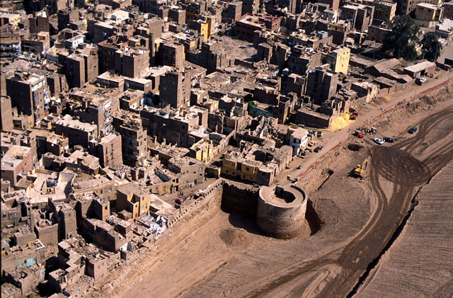 Aerial view north over the Darb al-Ahmar district and the length of the wall during excavation