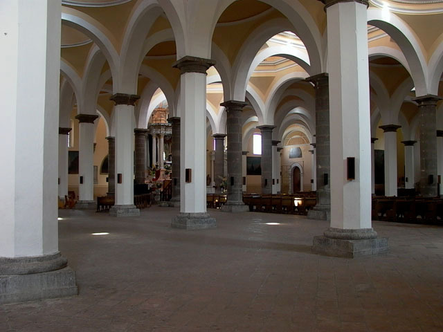 Interior view showing hall with columns and vaults