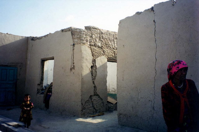 Interior view of house damaged in earthquake