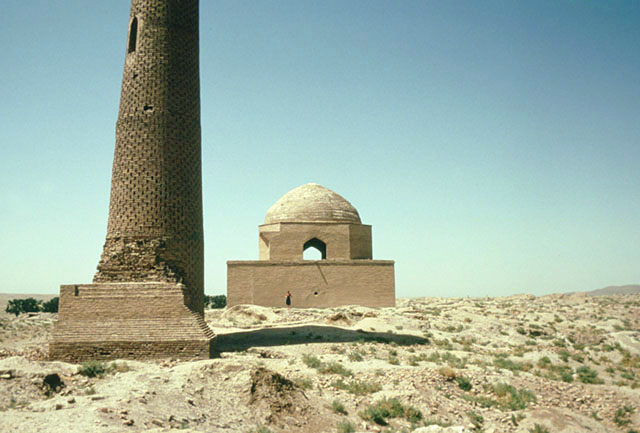 Exterior view of mausoleum, with base of minaret seen in the foreground
