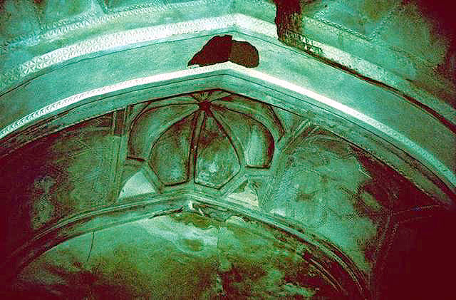 Interior view of mosque showing arch with dome