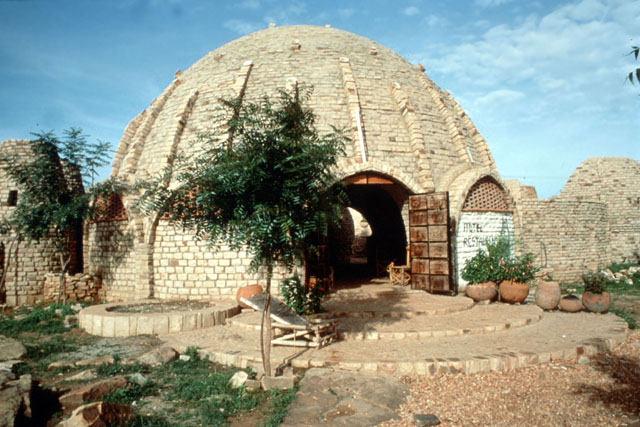 Exterior view, showing mud brick dome construction