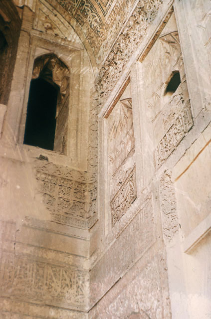 Madrasa-i Shamsiya - Interior detail of south iwan; arched niches and carved stucco decoration, upper southwest corner