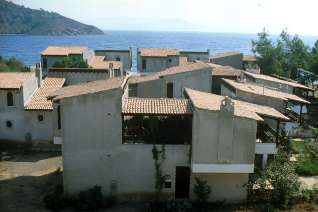 Elevated view showing clay roofs and sea