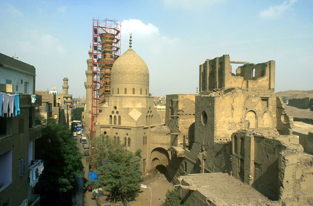 Elevated view showing ruined palace with the Khayrbak Complex, under restoration