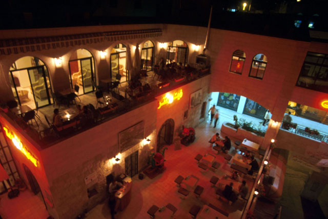 Aerial view showing courtyard and encompassing galleries and dining areas