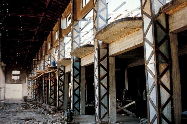 Interior view of central hall, during restoration, showing strengthening of structure