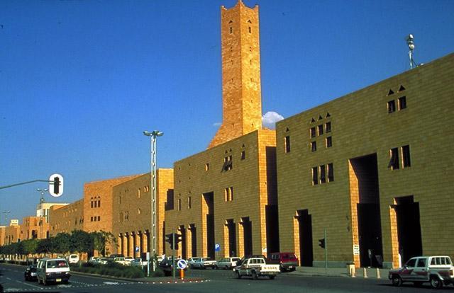 Great Mosque of Riyadh and the Old City Center Redevelopment - Exterior from street, walls of the prayer hall contain arcades, shops, and offices