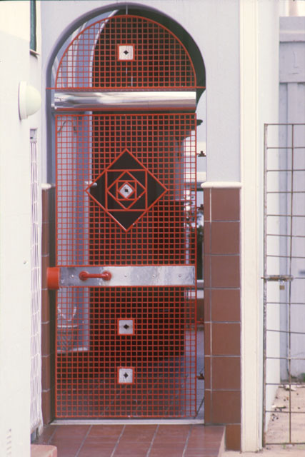 Exterior detail showing painted wire door