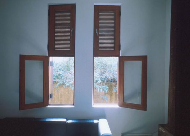 View through wooden shuttered window frame