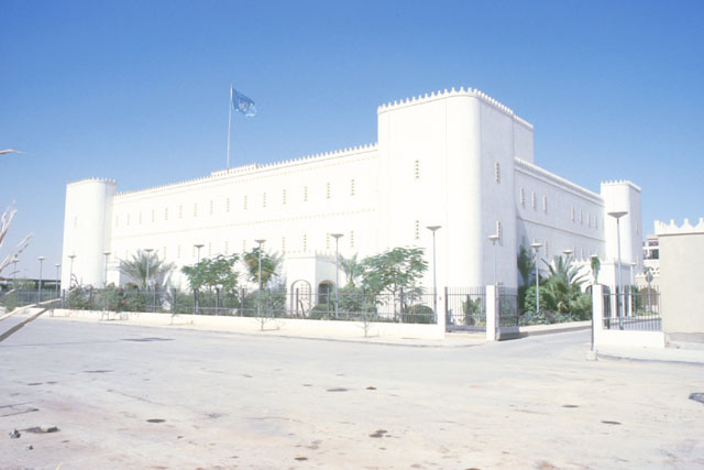 Exterior view showing white-washed façade