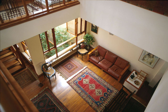 Omar House - View from upper story into living area