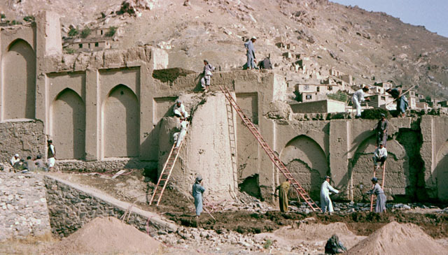 Eastern garden wall, during restoration, showing hand-laying of traditional <i>pakhsa</i>