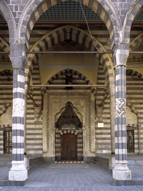 View of mosque portal across double portico