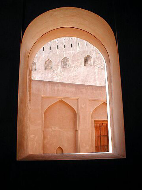 Window with rounded arch overlooking inner courtyard