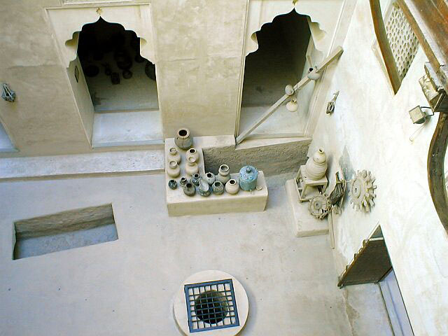 View looking down into southwest courtyard with well and cooking corner