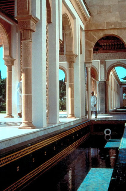 Interior view, showing marble fountain against archways