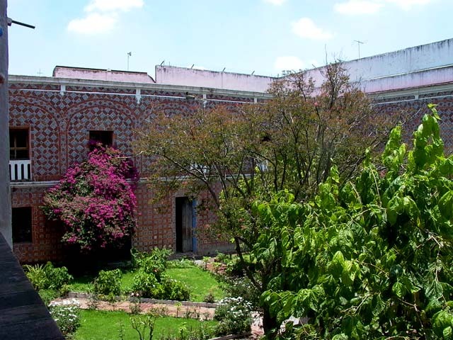 View towards the courtyard of the cloister, showing its tiled walls