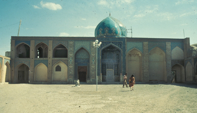 Darb-i Imam - North facade featuring the two glazed tile domes.