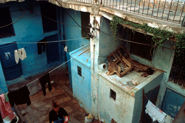 View form rooftop showing dilapidated courtyard