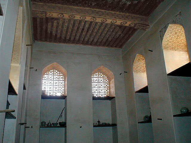 The Sun and Moon Room with arched niches and painted wooden ceiling