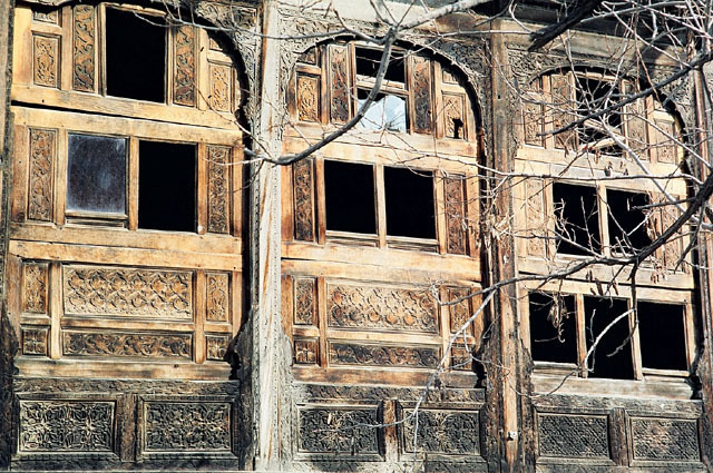 South elevation to courtyard with carved timber <i>patai</i> screens; before restoration
