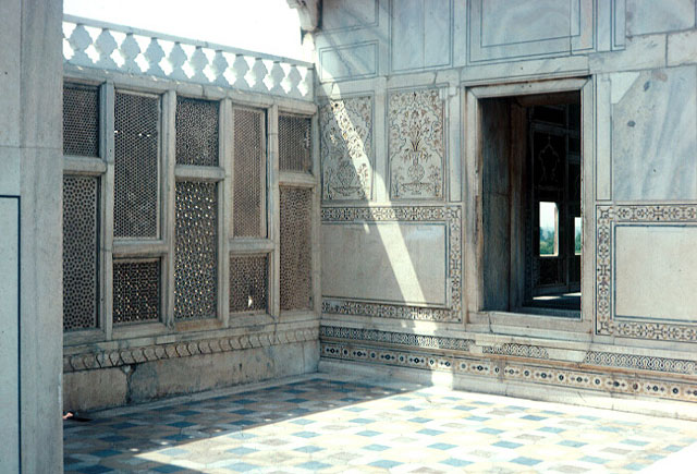 Exterior view of shadow patterns outside the pavilion; wall and tile patterns