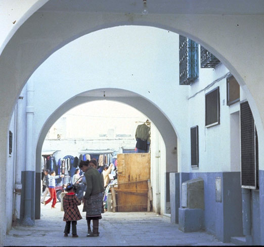 Hafsia Quarter I Conservation - Arches frame a paved pedestrian street