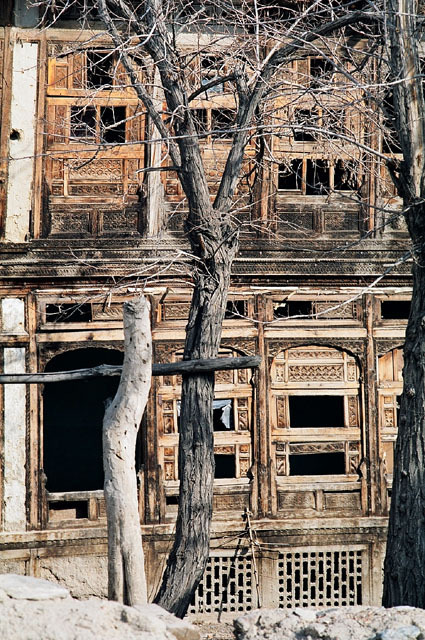 South elevation to courtyard with carved timber <i>patai</i> screens and basement grilles; before restoration