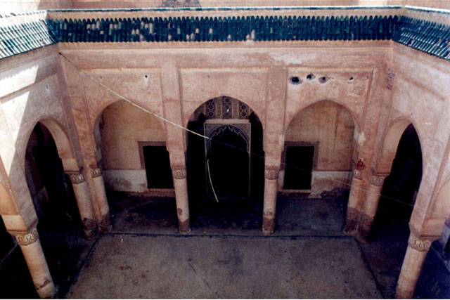 Dar Bellarj Foundation - Exterior view from second story showing columned courtyard, clay roof tiles and tile work decoration