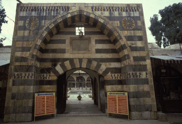 Main gate of madrasa along souk