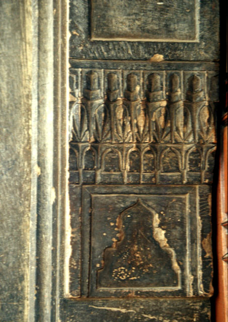Nilüfer Hatun Imareti - Exterior detail showing muqarnas decoration on the jamb of the main door