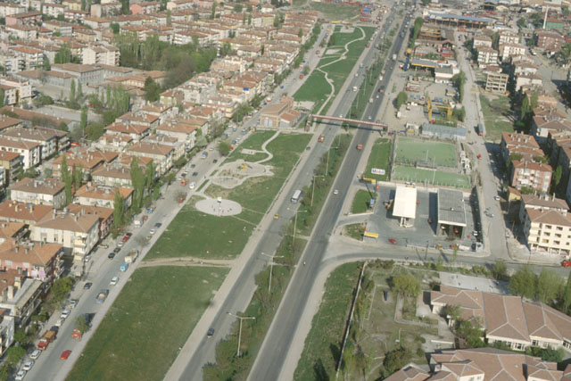 Aerial view showing traffic artery through residential areas
