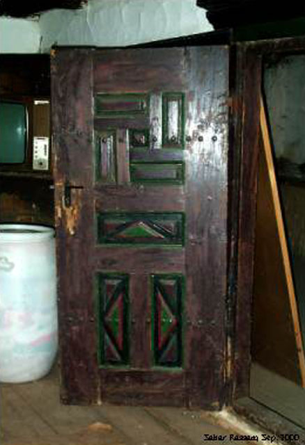 Interior, wooden door in the main room