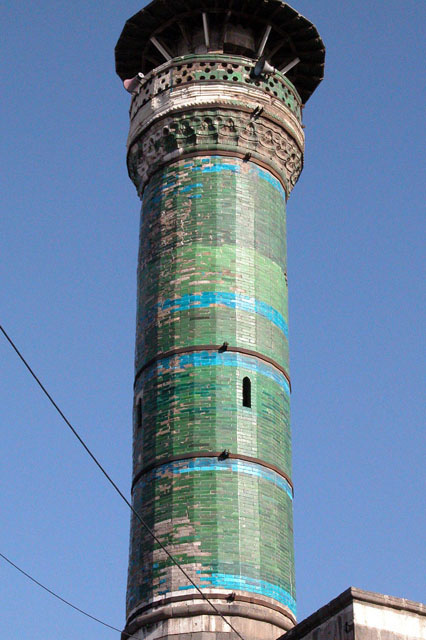 View of the green, glazed brick minaret
