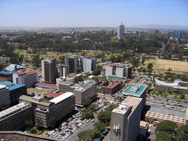 Elevated view looking southwest from KICC tower, with Rahimtulla Trust Building seen behind Uhuru Park