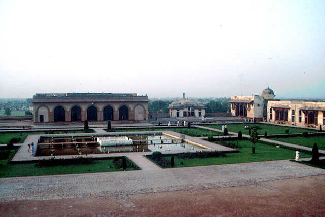 Exterior view of the royal residences, showing courtyard, access and central pool with fountain fixtures