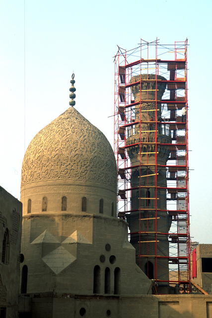 Exterior view from roof, showing dome and minaret
