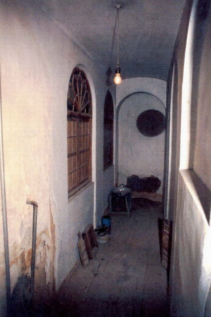 Interior view of a corridor, before restoration